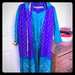 Purple and sea green suit